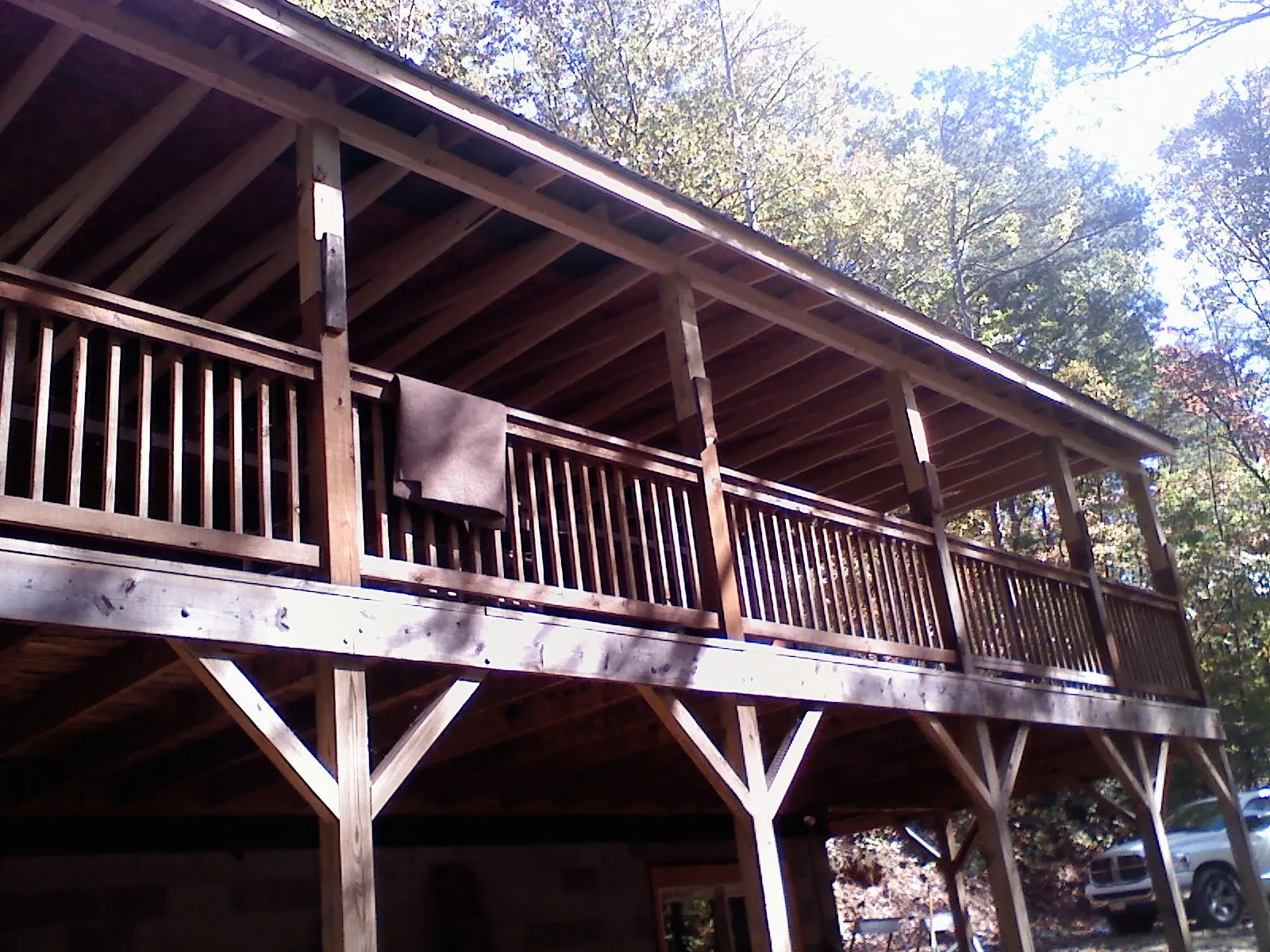 Timber framing under a new elevated porch and deck — Roof Leak Repair in Norcross by Roofing Brothers